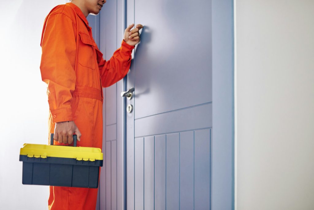 Handyman knocking on door